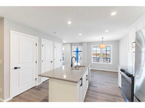 257 Yorkville Boulevard Sw, Calgary, AB - Indoor Photo Showing Kitchen With Double Sink