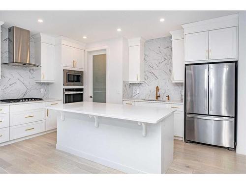 273 Ambleside Avenue Nw, Calgary, AB - Indoor Photo Showing Kitchen With Stainless Steel Kitchen With Upgraded Kitchen