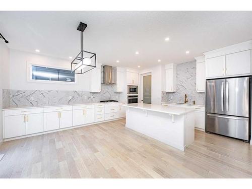 273 Ambleside Avenue Nw, Calgary, AB - Indoor Photo Showing Kitchen With Stainless Steel Kitchen With Upgraded Kitchen