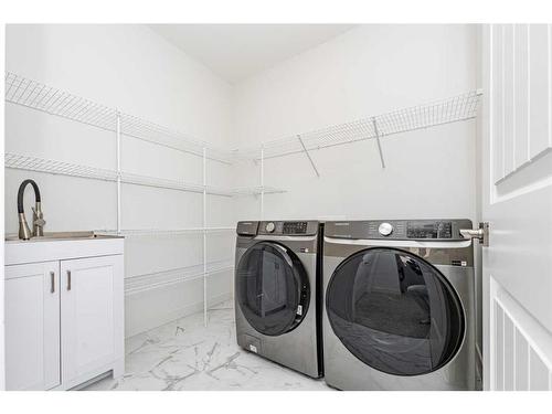 273 Ambleside Avenue Nw, Calgary, AB - Indoor Photo Showing Laundry Room