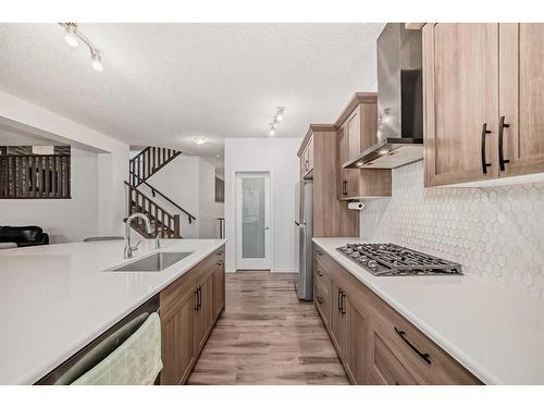 2007 Windbury Crescent Sw, Airdrie, AB - Indoor Photo Showing Kitchen With Upgraded Kitchen