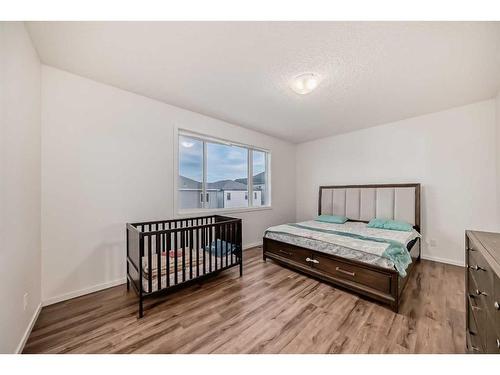 2007 Windbury Crescent Sw, Airdrie, AB - Indoor Photo Showing Bedroom