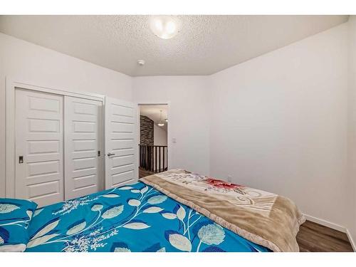 2007 Windbury Crescent Sw, Airdrie, AB - Indoor Photo Showing Bedroom