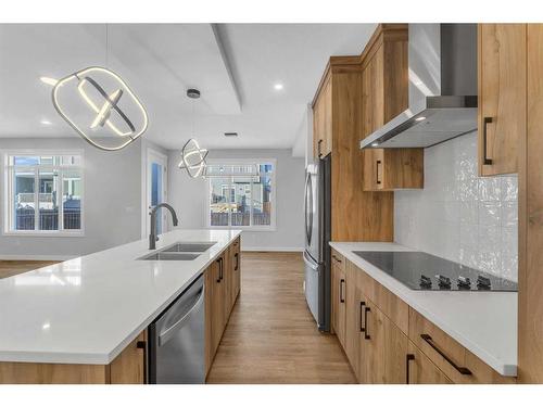 19 Sandpiper Bend, Chestermere, AB - Indoor Photo Showing Kitchen With Double Sink With Upgraded Kitchen