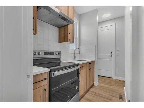 19 Sandpiper Bend, Chestermere, AB - Indoor Photo Showing Kitchen