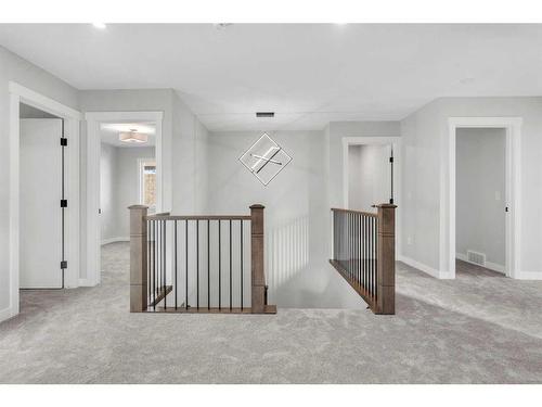 19 Sandpiper Bend, Chestermere, AB - Indoor Photo Showing Other Room