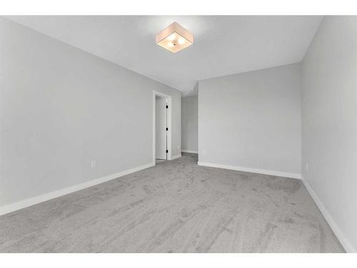 19 Sandpiper Bend, Chestermere, AB - Indoor Photo Showing Other Room