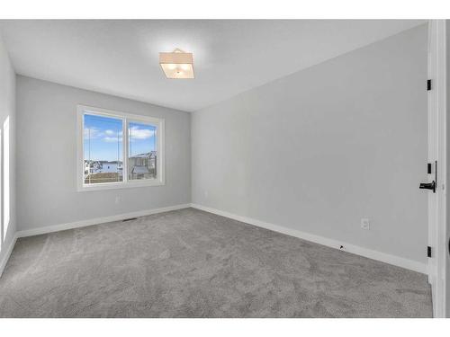 19 Sandpiper Bend, Chestermere, AB - Indoor Photo Showing Other Room