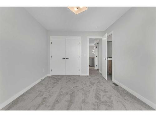 19 Sandpiper Bend, Chestermere, AB - Indoor Photo Showing Other Room