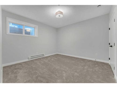 19 Sandpiper Bend, Chestermere, AB - Indoor Photo Showing Other Room