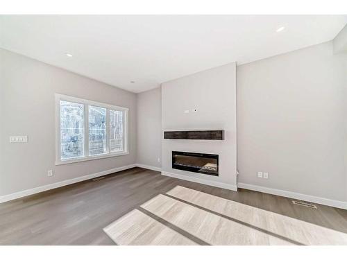 31 Homestead Passage Ne, Calgary, AB - Indoor Photo Showing Living Room With Fireplace