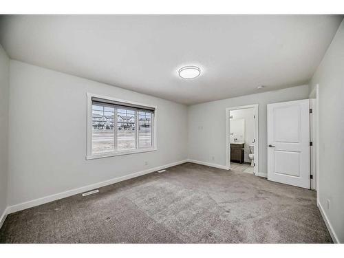 67 Belgian Crescent, Cochrane, AB - Indoor Photo Showing Other Room