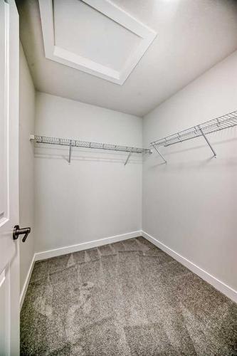 67 Belgian Crescent, Cochrane, AB - Indoor With Storage