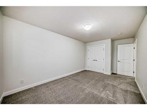 67 Belgian Crescent, Cochrane, AB - Indoor Photo Showing Other Room