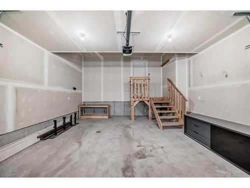 67 Belgian Crescent, Cochrane, AB - Indoor Photo Showing Garage