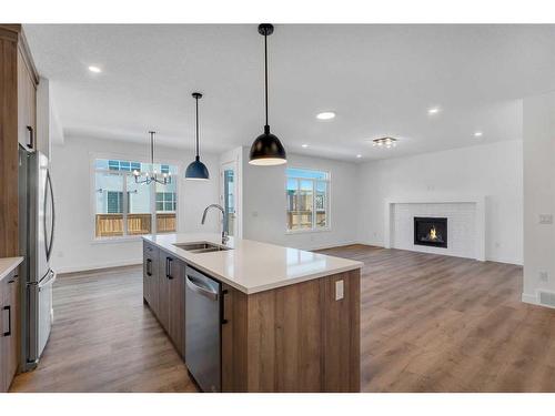 239 Kinniburgh Loop, Chestermere, AB - Indoor Photo Showing Kitchen With Double Sink With Upgraded Kitchen