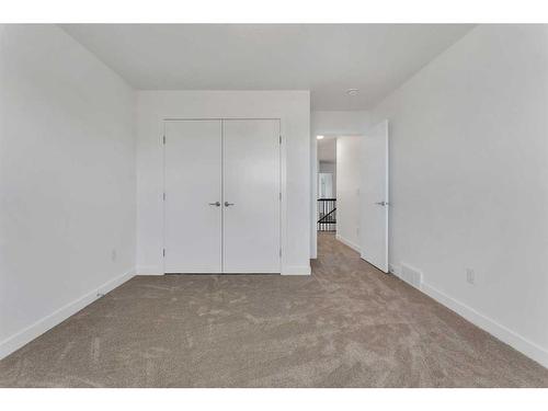 239 Kinniburgh Loop, Chestermere, AB - Indoor Photo Showing Other Room