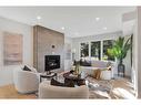 42 Canova Road Sw, Calgary, AB  - Indoor Photo Showing Living Room With Fireplace 