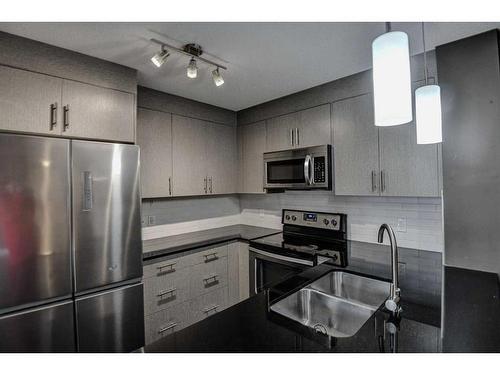 2117-240 Skyview Ranch Road Ne, Calgary, AB - Indoor Photo Showing Kitchen With Stainless Steel Kitchen With Double Sink With Upgraded Kitchen