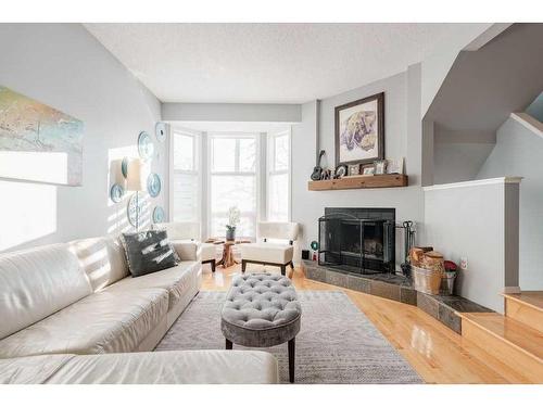 747 5A Street Nw, Calgary, AB - Indoor Photo Showing Living Room With Fireplace