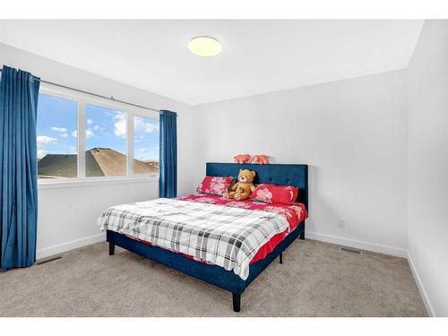 2038 Fowler Road Sw, Airdrie, AB - Indoor Photo Showing Bedroom