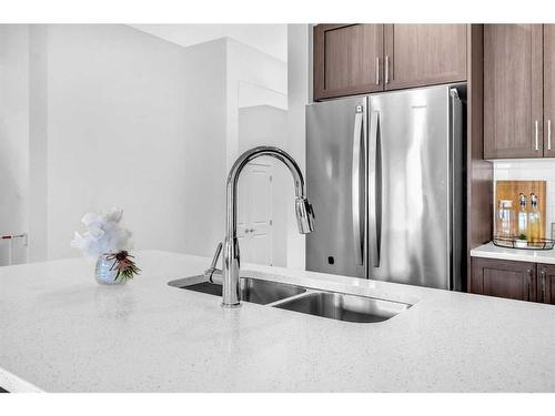 2038 Fowler Road Sw, Airdrie, AB - Indoor Photo Showing Kitchen With Double Sink With Upgraded Kitchen