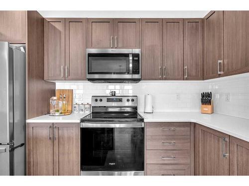 2038 Fowler Road Sw, Airdrie, AB - Indoor Photo Showing Kitchen