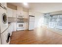 306-10 Brentwood Common Nw, Calgary, AB  - Indoor Photo Showing Laundry Room 