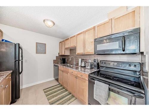 412-930 18 Avenue Sw, Calgary, AB - Indoor Photo Showing Kitchen