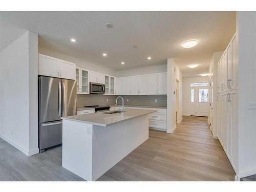 2070 Fowler Road Sw, Airdrie, AB - Indoor Photo Showing Kitchen With Upgraded Kitchen