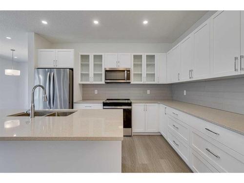 2070 Fowler Road Sw, Airdrie, AB - Indoor Photo Showing Kitchen With Double Sink With Upgraded Kitchen