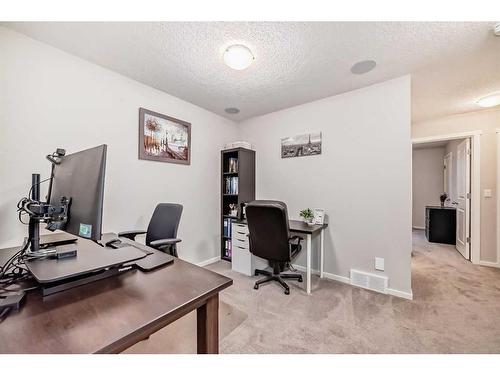 18 Legacy Boulevard Se, Calgary, AB - Indoor Photo Showing Other Room