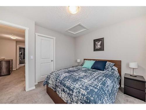 18 Legacy Boulevard Se, Calgary, AB - Indoor Photo Showing Bedroom