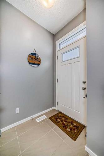 18 Legacy Boulevard Se, Calgary, AB - Indoor Photo Showing Other Room