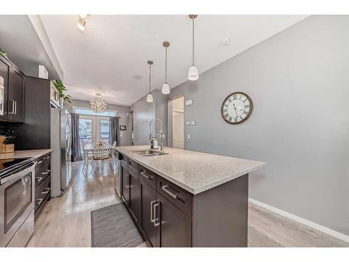 18 Legacy Boulevard Se, Calgary, AB - Indoor Photo Showing Kitchen With Double Sink With Upgraded Kitchen