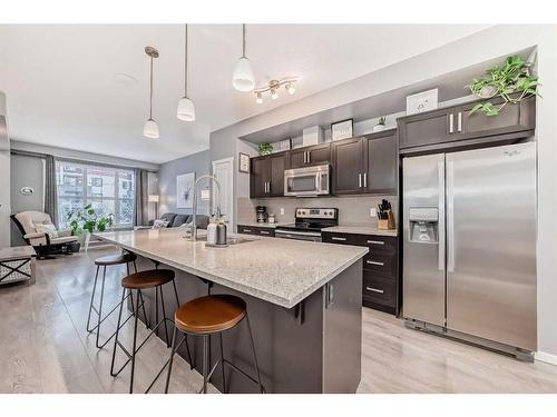 18 Legacy Boulevard Se, Calgary, AB - Indoor Photo Showing Kitchen With Stainless Steel Kitchen With Upgraded Kitchen