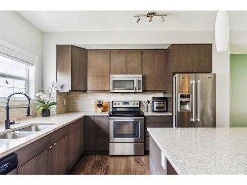 113 Nolancrest Common Nw, Calgary, AB - Indoor Photo Showing Kitchen With Stainless Steel Kitchen With Double Sink With Upgraded Kitchen