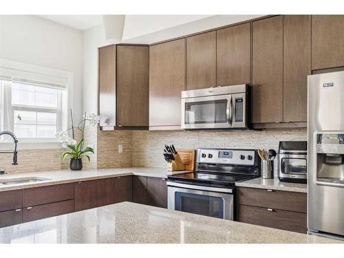 113 Nolancrest Common Nw, Calgary, AB - Indoor Photo Showing Kitchen With Stainless Steel Kitchen With Upgraded Kitchen