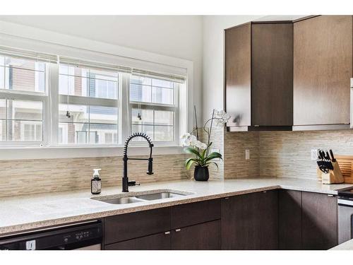 113 Nolancrest Common Nw, Calgary, AB - Indoor Photo Showing Kitchen With Double Sink