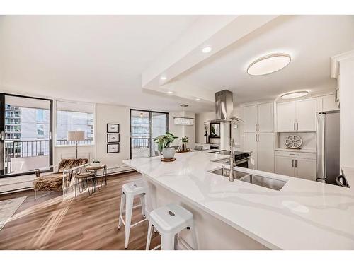 7D-133 25 Avenue Sw, Calgary, AB - Indoor Photo Showing Kitchen With Double Sink