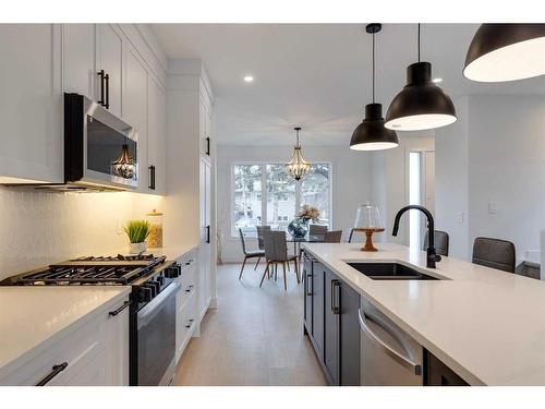 4909 19 Avenue Nw, Calgary, AB - Indoor Photo Showing Kitchen With Upgraded Kitchen