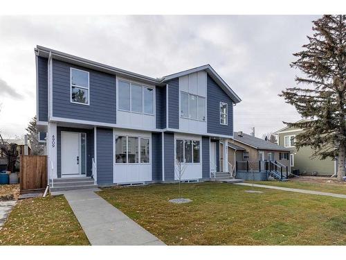 4909 19 Avenue Nw, Calgary, AB - Outdoor With Deck Patio Veranda With Facade