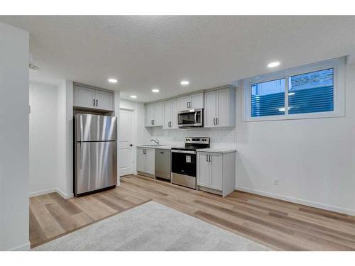 545 Bayview Street Sw, Airdrie, AB - Indoor Photo Showing Kitchen With Stainless Steel Kitchen