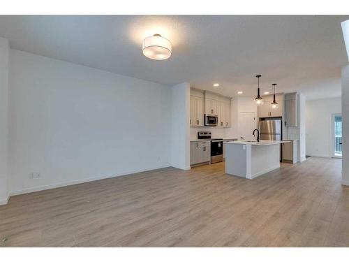 545 Bayview Street Sw, Airdrie, AB - Indoor Photo Showing Kitchen