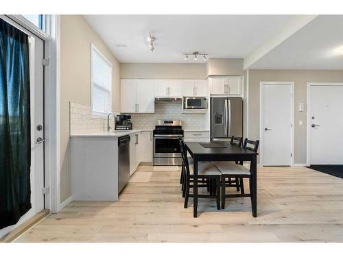 202-375 Redstone Walk Ne, Calgary, AB - Indoor Photo Showing Kitchen