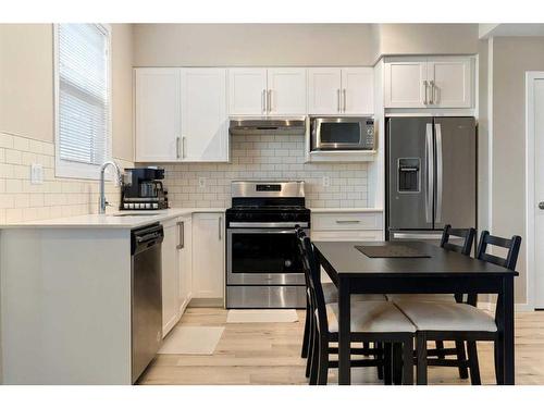 202-375 Redstone Walk Ne, Calgary, AB - Indoor Photo Showing Kitchen