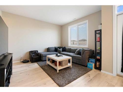 202-375 Redstone Walk Ne, Calgary, AB - Indoor Photo Showing Living Room