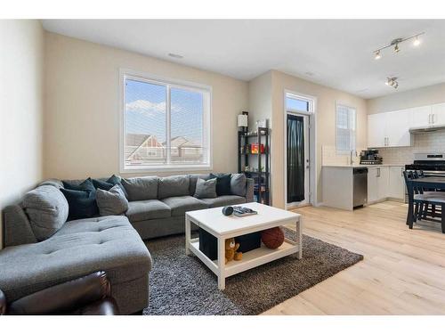 202-375 Redstone Walk Ne, Calgary, AB - Indoor Photo Showing Living Room