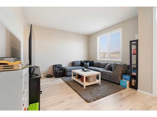 202-375 Redstone Walk Ne, Calgary, AB - Indoor Photo Showing Living Room