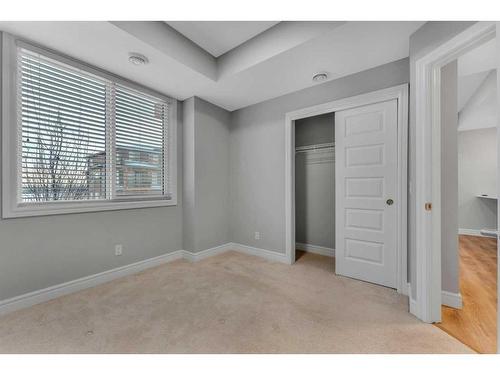 81-230 Seton Passage Se, Calgary, AB - Indoor Photo Showing Other Room